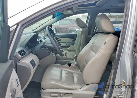 2012 Honda Odyssey Touring z USA, uszkodzony, nr VIN 5FNRL5H9XCB043913